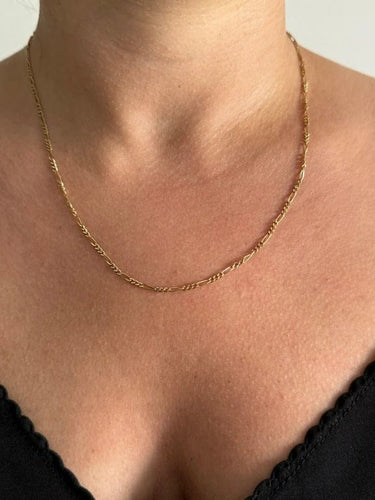 Collier Chaîne maille Figaro en or jaune 18 carats 58 Facettes