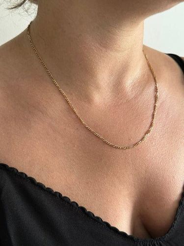 Collier Chaîne maille Figaro en or jaune 18 carats 58 Facettes