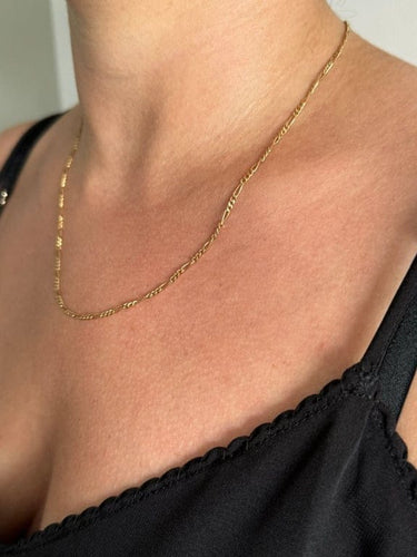 Collier Chaîne maille Figaro en or jaune 18 carats 58 Facettes