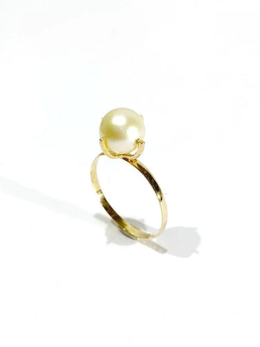 Bague 53.5 Bague en or jaune 18 carats et perle 58 Facettes