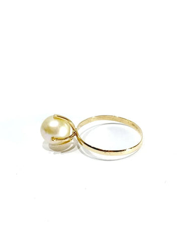 Bague 53.5 Bague en or jaune 18 carats et perle 58 Facettes