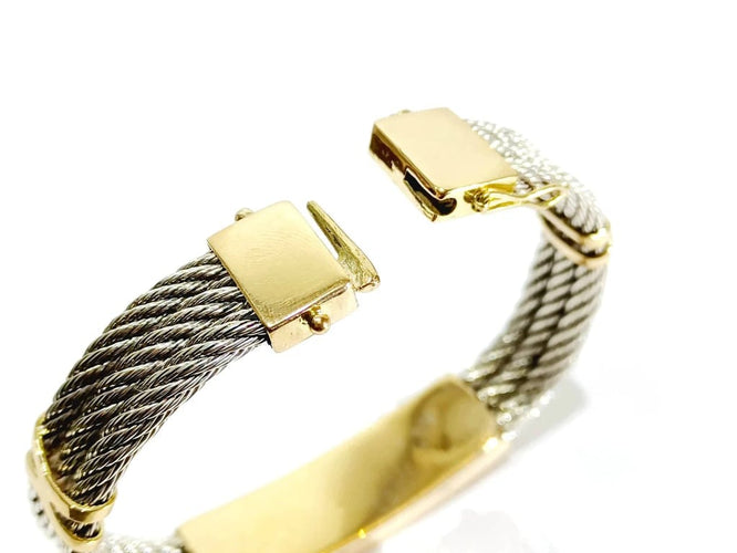 Bracelet Bracelet en or jaune 18 carats et argent à câbles tressés 58 Facettes