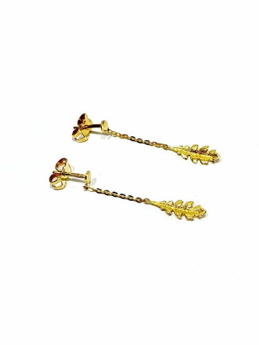 Boucles d'oreilles Boucles d’oreilles pendantes feuilles en or 18 carats 58 Facettes 3483
