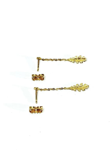 Boucles d'oreilles Boucles d’oreilles pendantes feuilles en or 18 carats 58 Facettes 3483