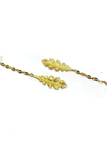 Boucles d'oreilles Boucles d’oreilles pendantes feuilles en or 18 carats 58 Facettes 3483