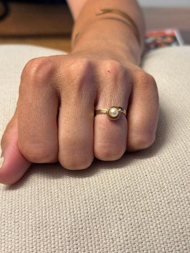 Bague 52 Bague en or jaune 18 carats et perle 58 Facettes