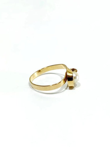 Bague 52 Bague en or jaune 18 carats et perle 58 Facettes