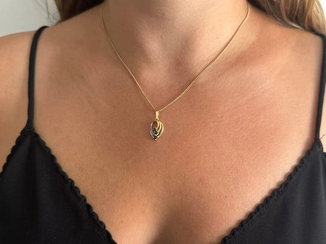 Pendentif Pendentif en or jaune et or blanc 18 carats, diamants et saphirs 58 Facettes