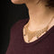 Collier Collier draperie ancien en or jaune 18 carats, saphirs, rubis et perles 58 Facettes 15-168