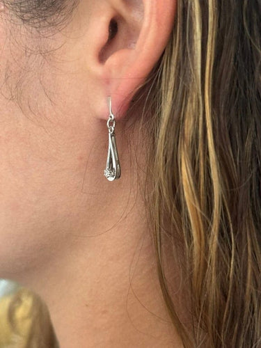 Boucles d'oreilles Boucles d’oreilles en or blanc 18 carats et diamants 58 Facettes
