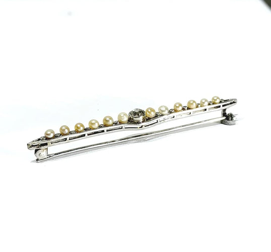 Broche Broche en or blanc 18 carats, diamants et perles 58 Facettes