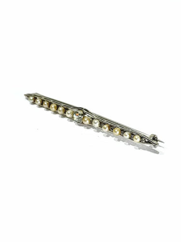 Broche Broche en or blanc 18 carats, diamants et perles 58 Facettes