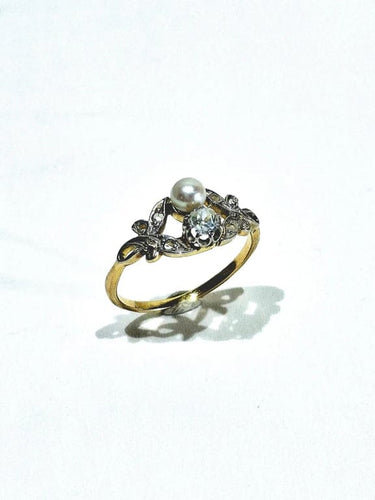 Bague 59 Bague Art nouveau en or jaune et blanc 18 carats, diamants et perle 58 Facettes