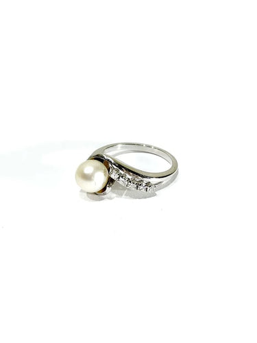 Bague 52 Bague en or blanc 18 carats avec perle et diamants 58 Facettes