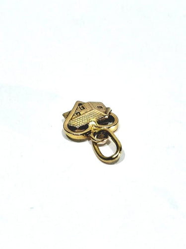 Pendentif Pendentif maison dans un cœur en or rose 18 carats 58 Facettes