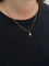 Pendentif Pendentif maison dans un cœur en or rose 18 carats 58 Facettes
