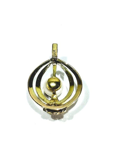 Pendentif Pendentif en or jaune 18 carats et perle 58 Facettes