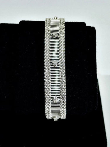 Bracelet Bracelet en or blanc ajouré avec diamants taille brillant 58 Facettes