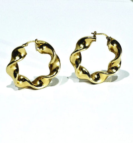 Boucles d'oreilles Créoles torsadées en or jaune 18 carats 58 Facettes