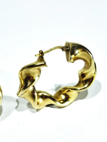 Boucles d'oreilles Créoles torsadées en or jaune 18 carats 58 Facettes