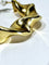 Boucles d'oreilles Créoles torsadées en or jaune 18 carats 58 Facettes