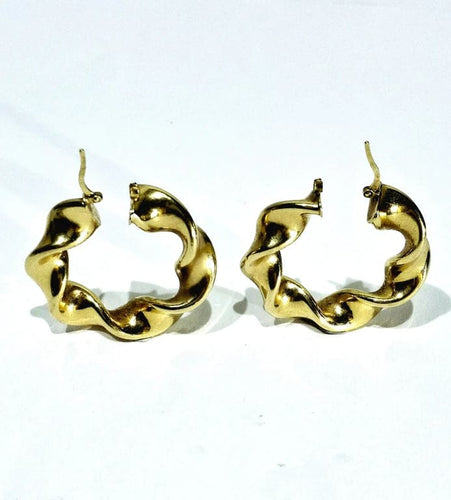 Boucles d'oreilles Créoles torsadées en or jaune 18 carats 58 Facettes