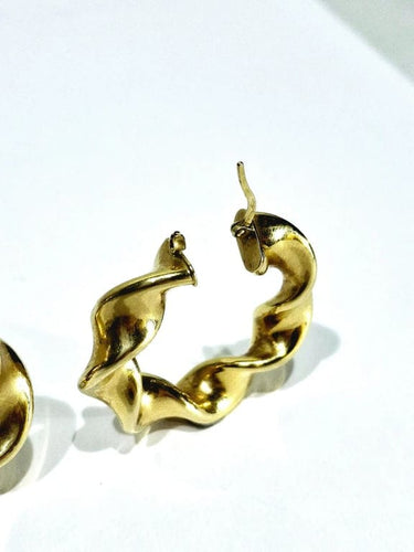Boucles d'oreilles Créoles torsadées en or jaune 18 carats 58 Facettes