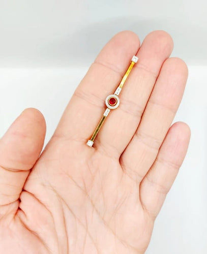 Broche Broche barrette Art déco en or jaune 18k avec pierre rouge 58 Facettes A06478