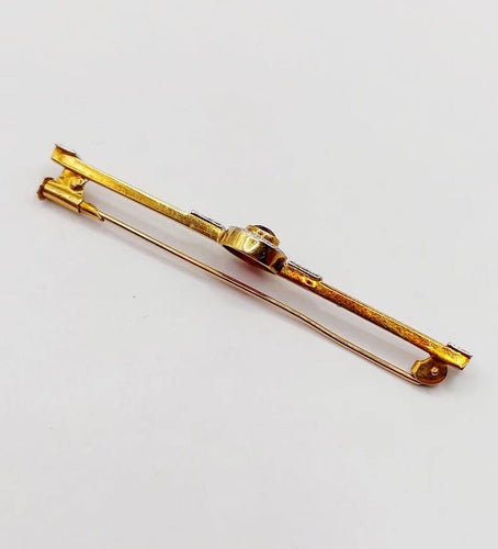 Broche Broche barrette Art déco en or jaune 18k avec pierre rouge 58 Facettes A06478