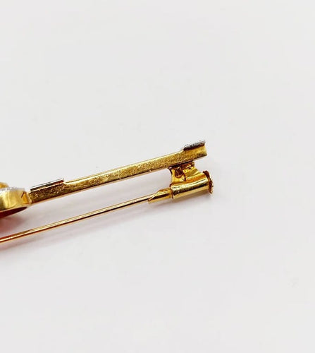 Broche Broche barrette Art déco en or jaune 18k avec pierre rouge 58 Facettes A06478