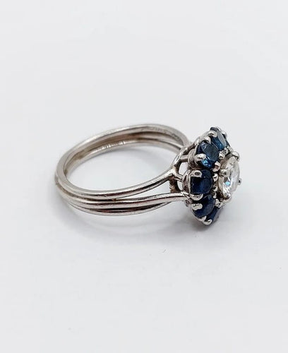 Bague 52 Bague marguerite Art déco en platine avec diamant 0,65 ct et saphirs 58 Facettes A06577
