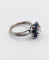 Bague 52 Bague marguerite Art déco en platine avec diamant 0,65 ct et saphirs 58 Facettes A06577