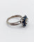 Bague 52 Bague marguerite Art déco en platine avec diamant 0,65 ct et saphirs 58 Facettes A06577