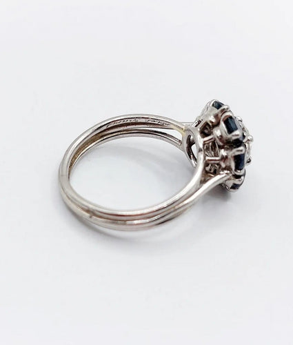 Bague 52 Bague marguerite Art déco en platine avec diamant 0,65 ct et saphirs 58 Facettes A06577