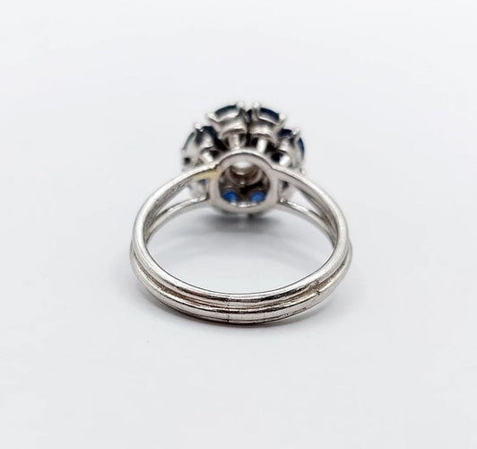 Bague 52 Bague marguerite Art déco en platine avec diamant 0,65 ct et saphirs 58 Facettes A06577