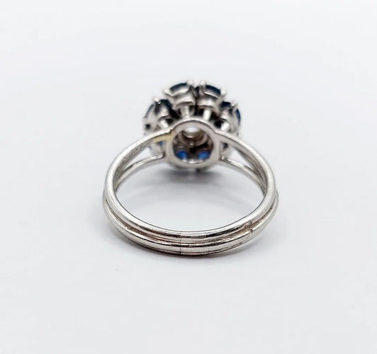 Bague 52 Bague marguerite Art déco en platine avec diamant 0,65 ct et saphirs 58 Facettes A06577