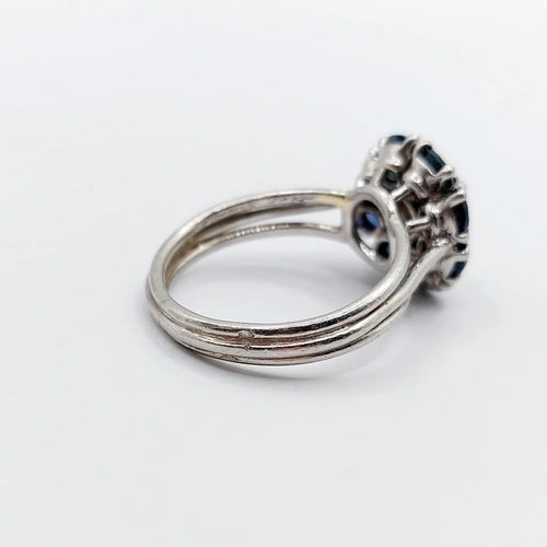 Bague 52 Bague marguerite Art déco en platine avec diamant 0,65 ct et saphirs 58 Facettes A06577