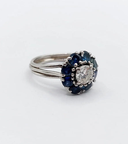 Bague 52 Bague marguerite Art déco en platine avec diamant 0,65 ct et saphirs 58 Facettes A06577