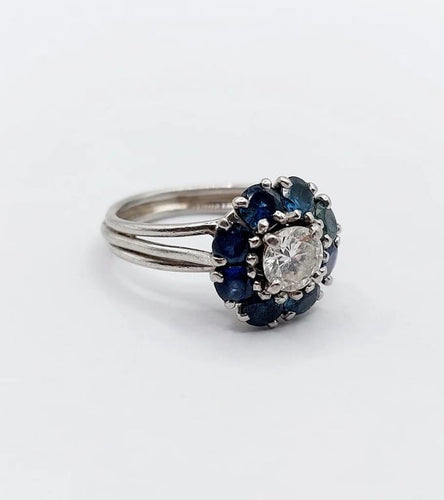 Bague 52 Bague marguerite Art déco en platine avec diamant 0,65 ct et saphirs 58 Facettes A06577