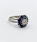 Bague 52 Bague marguerite Art déco en platine avec diamant 0,65 ct et saphirs 58 Facettes A06577