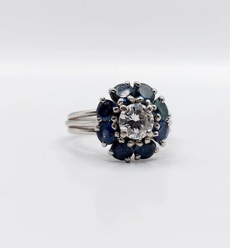 Bague 52 Bague marguerite Art déco en platine avec diamant 0,65 ct et saphirs 58 Facettes A06577
