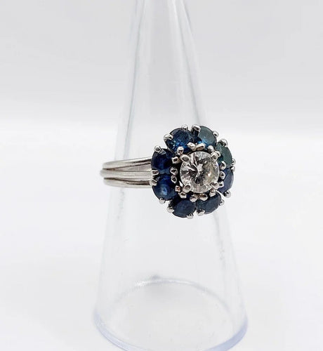 Bague 52 Bague marguerite Art déco en platine avec diamant 0,65 ct et saphirs 58 Facettes A06577