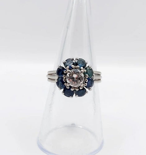 Bague 52 Bague marguerite Art déco en platine avec diamant 0,65 ct et saphirs 58 Facettes A06577