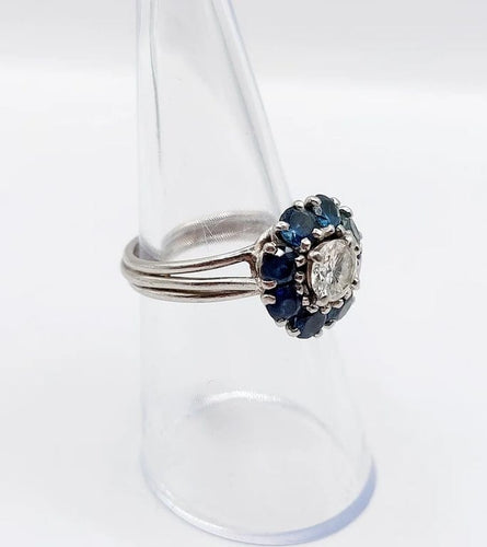 Bague 52 Bague marguerite Art déco en platine avec diamant 0,65 ct et saphirs 58 Facettes A06577