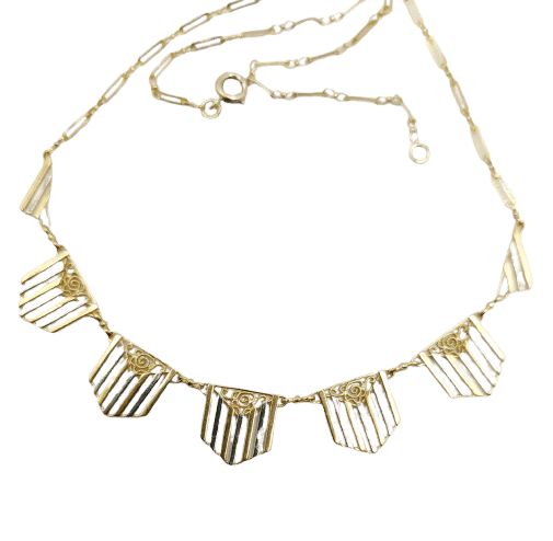 Collier Collier Art déco à motifs filigranés en or jaune et blanc 18k 58 Facettes A04100