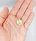 Pendentif Augis - Pendentif médaille d’amour 19 mm en or rose 18K et rubis 58 Facettes A06664