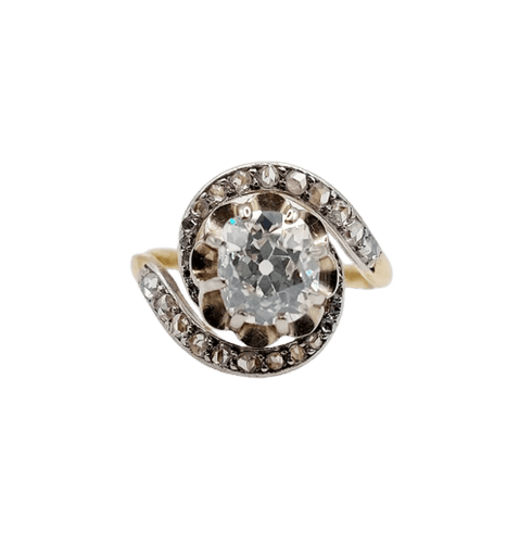 Bague 48 Bague tourbillon ancienne en or 18k et platine, diamants 58 Facettes A06630