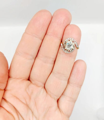 Bague 48 Bague tourbillon ancienne en or 18k et platine, diamants 58 Facettes A06630