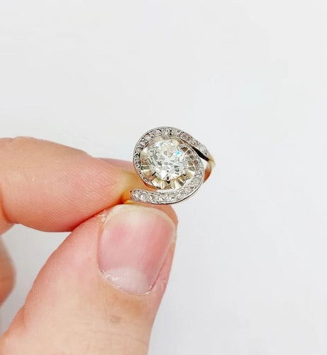 Bague 48 Bague tourbillon ancienne en or 18k et platine, diamants 58 Facettes A06630
