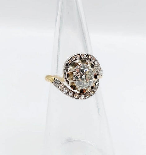 Bague 48 Bague tourbillon ancienne en or 18k et platine, diamants 58 Facettes A06630